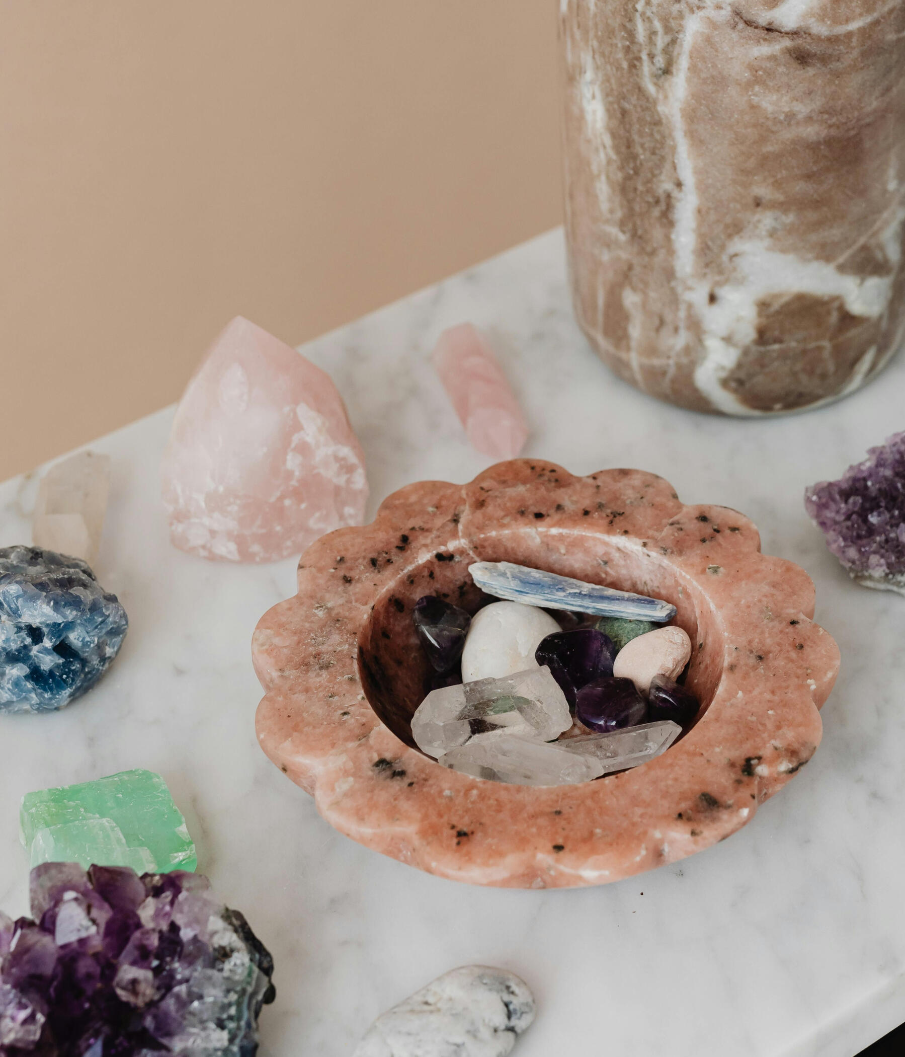 crystal healing course This is a photo of a bowl of crystals surrounded by other crystals