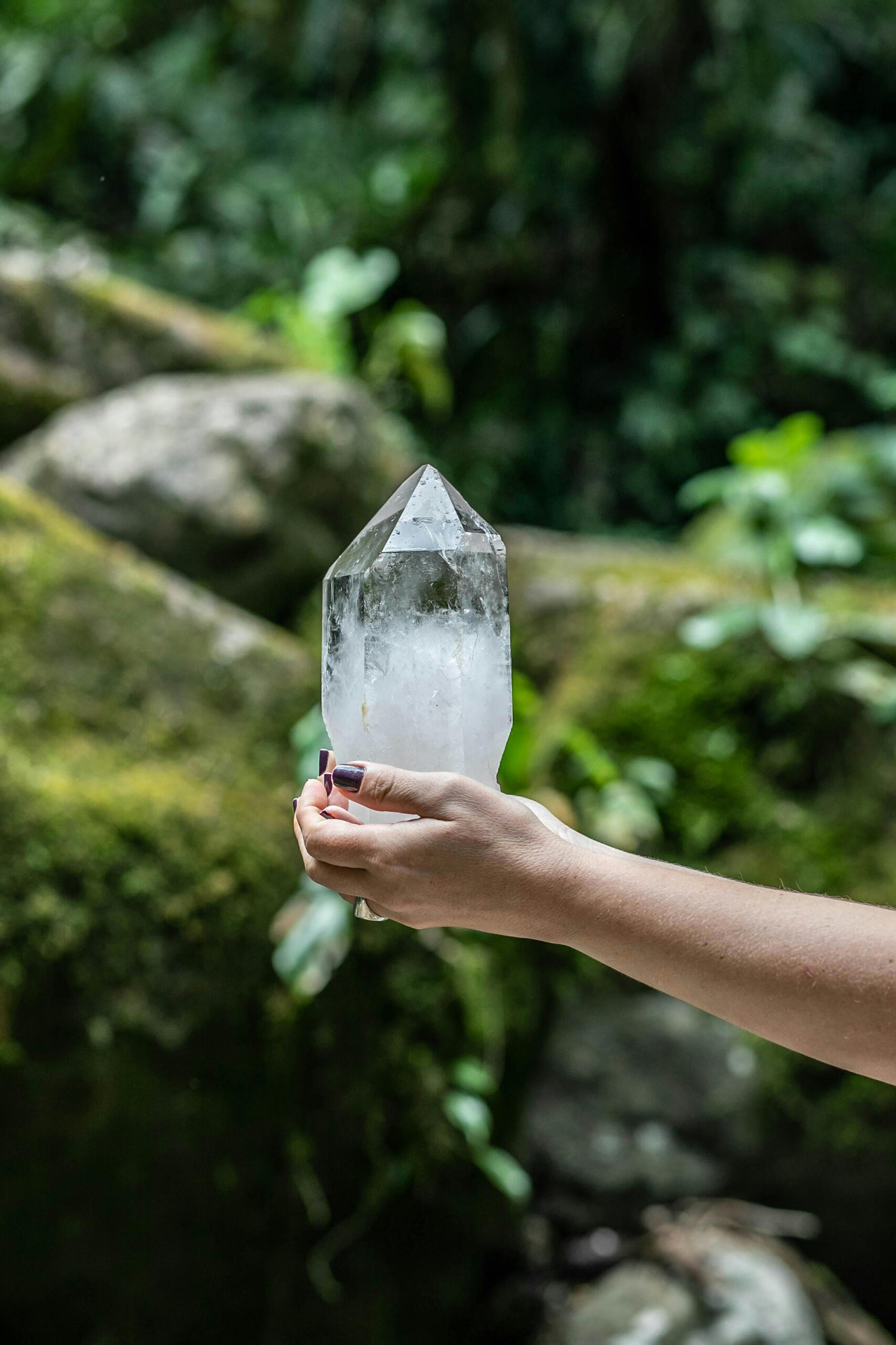 Crystal healing This is a photo of a large Clear Quartz crystal in a hand